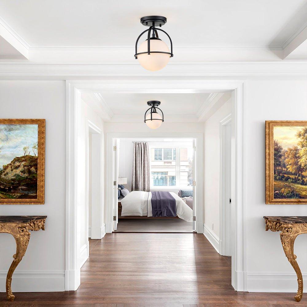 Globe ceiling lights integrated into a refined boutique hospitality interior