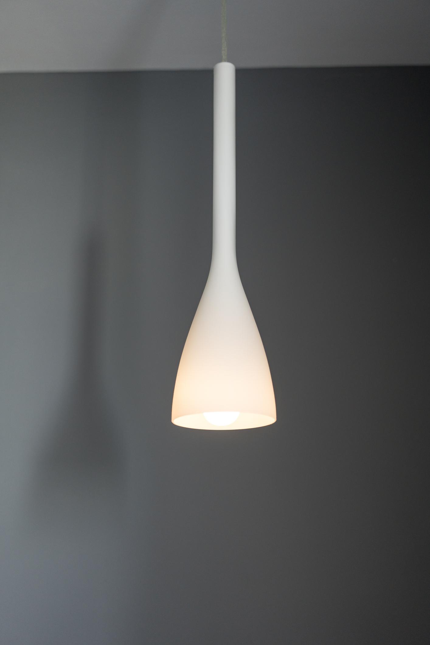 Front view of a minimal pendant light.