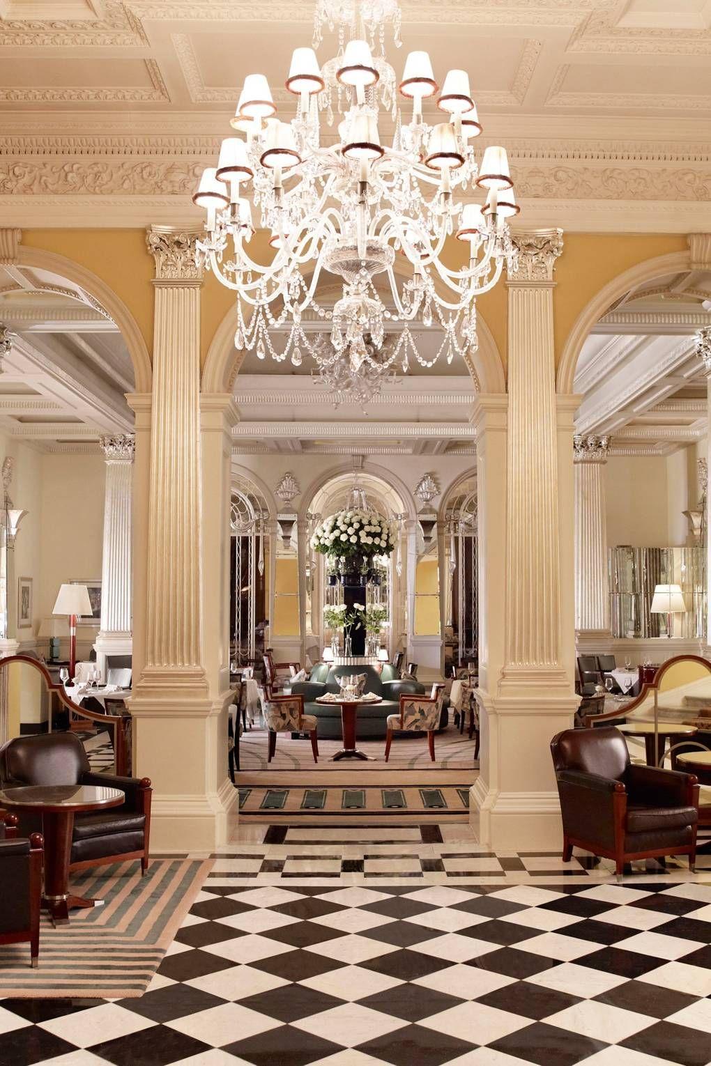 Classic chandelier installed in a prestigious historic hospitality interior.