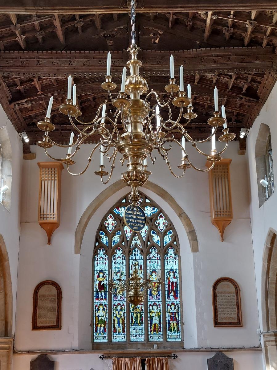 Classic chandelier installed in a prestigious historic hospitality interior.