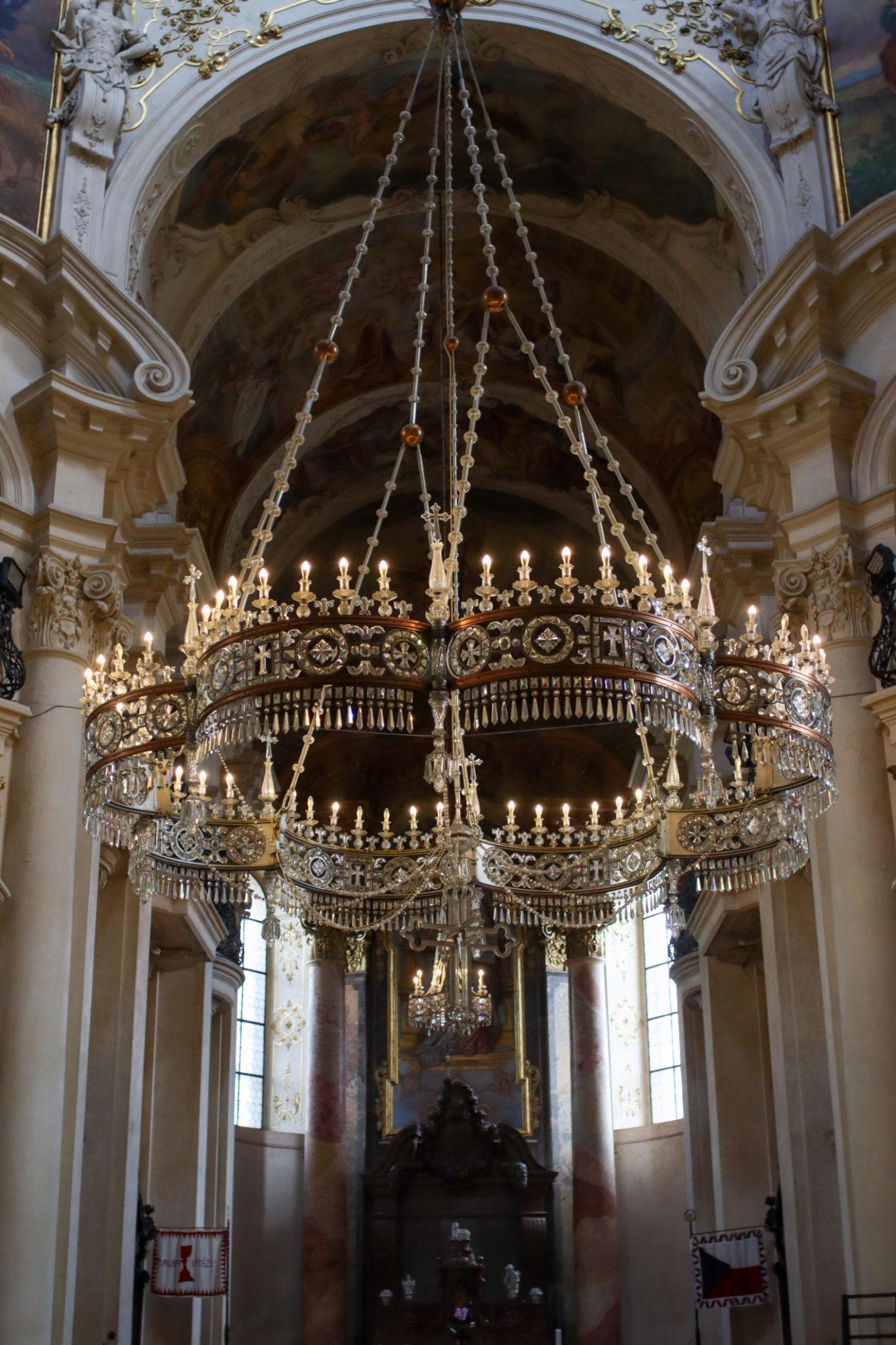 Classic chandelier installed in a prestigious historic hospitality interior.