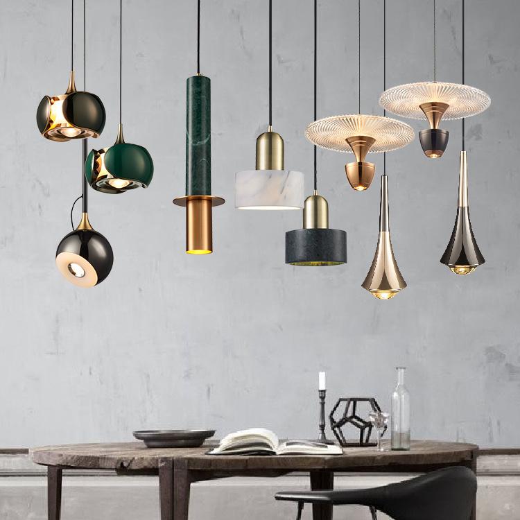 Contemporary pendant light collection with different sizes, finishes and suspension options.