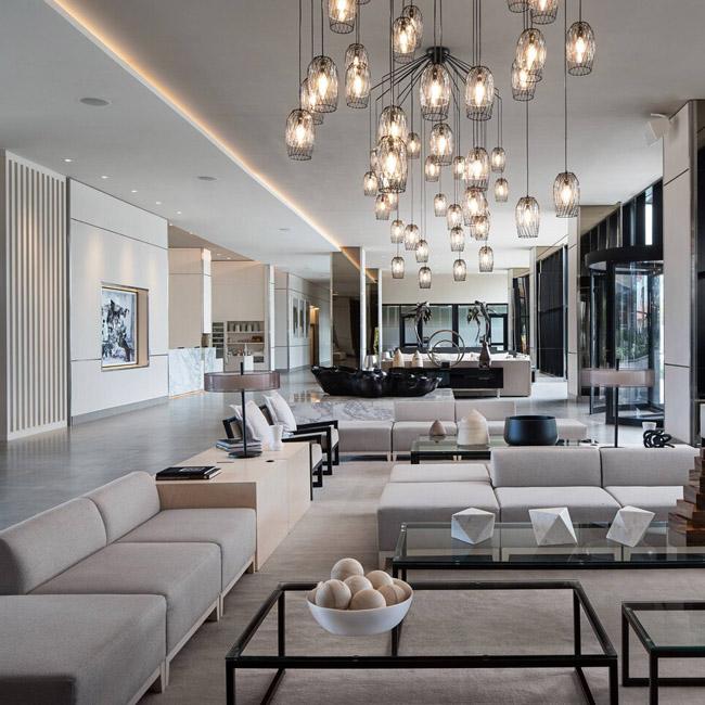 Contemporary pendant lights installed in a modern hospitality interior.