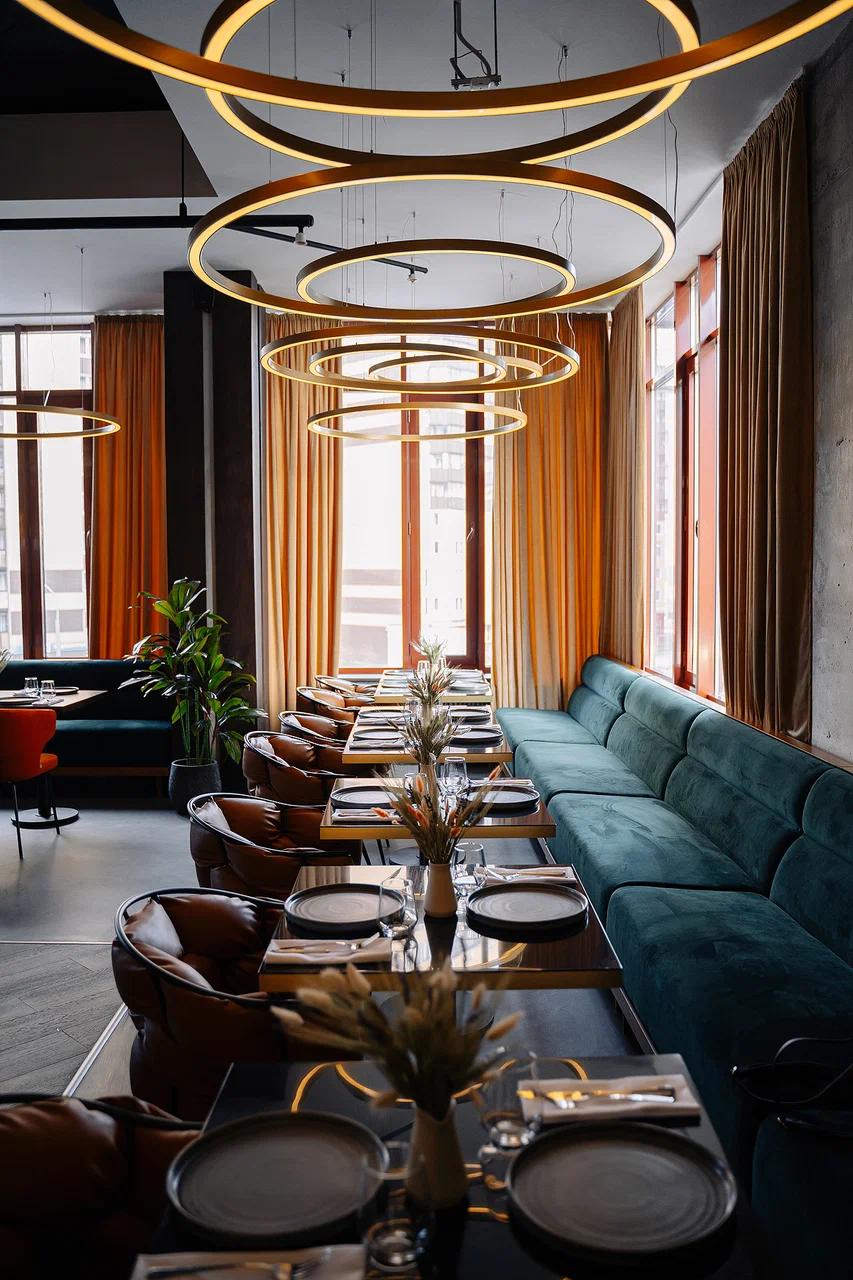 Contemporary pendant lights installed in a modern hospitality interior.