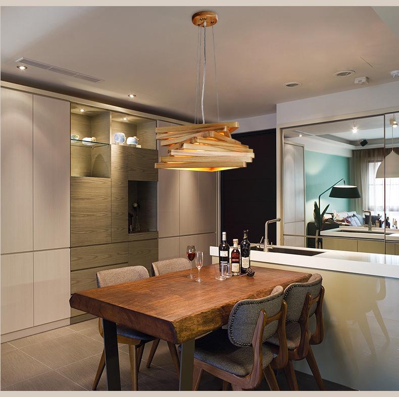 Wooden pendant lighting installed in a contemporary hospitality interior.