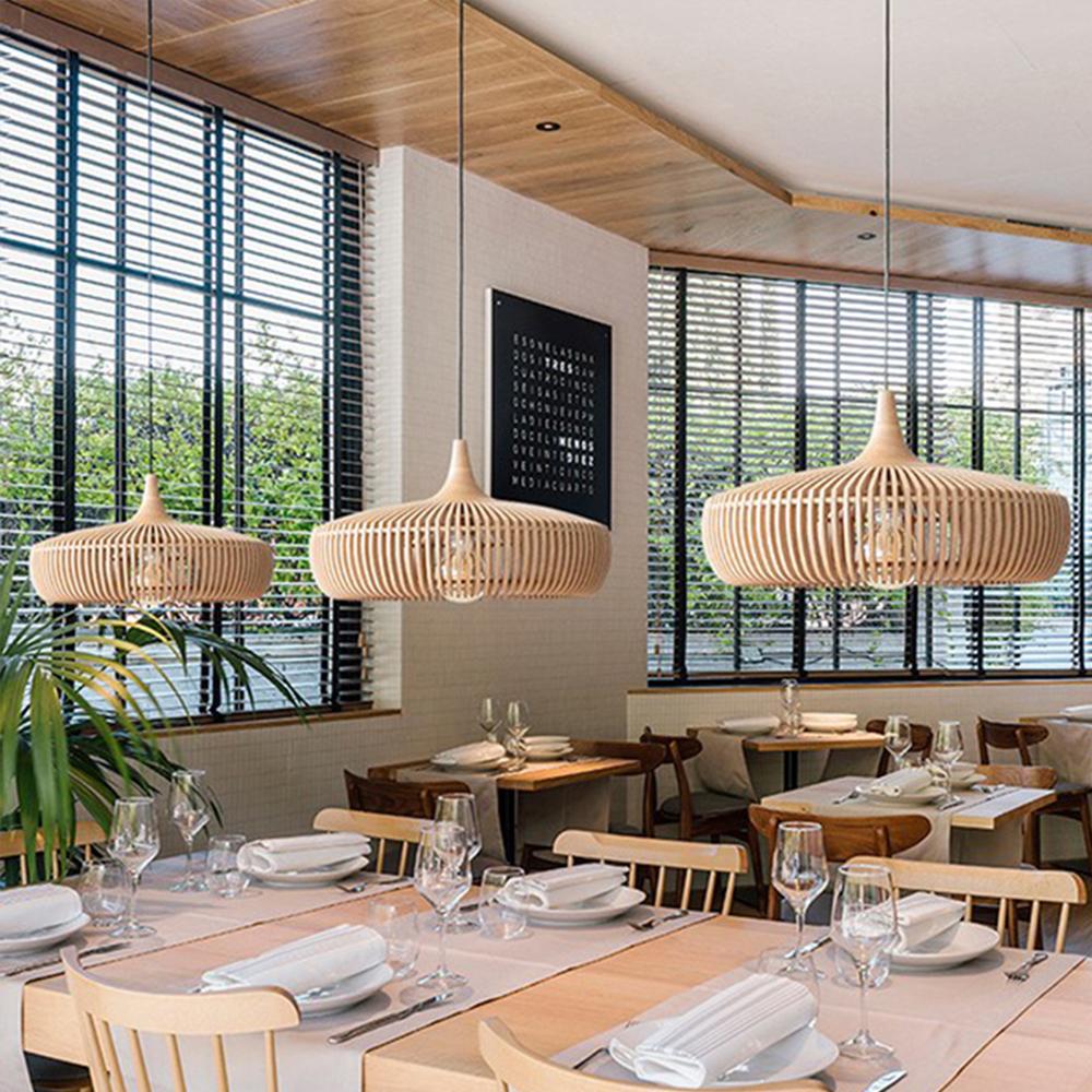 Wooden pendant lighting installed in a contemporary hospitality interior.