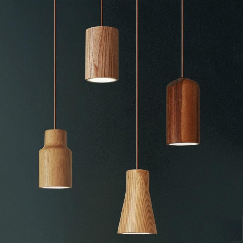 Wooden pendant lighting family featuring multiple sizes and design variations.