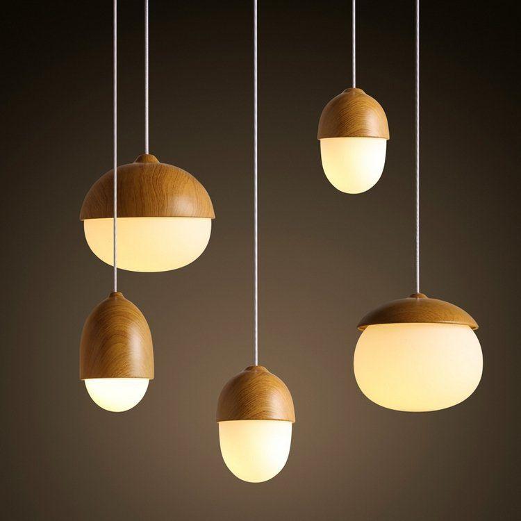 Wooden pendant lighting family featuring multiple sizes and design variations.