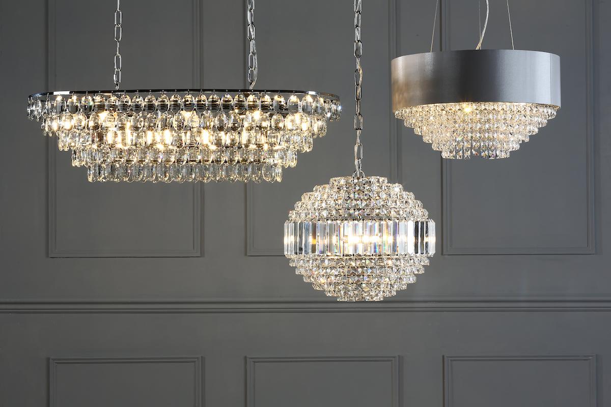Crystal chandelier family featuring multiple sizes and sculptural configurations.