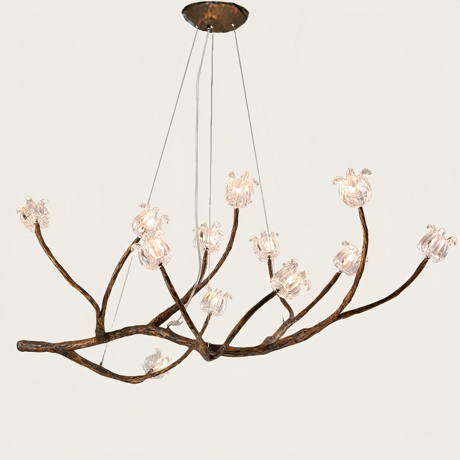 Front view of a sculptural organic chandelier with flowing contemporary forms.