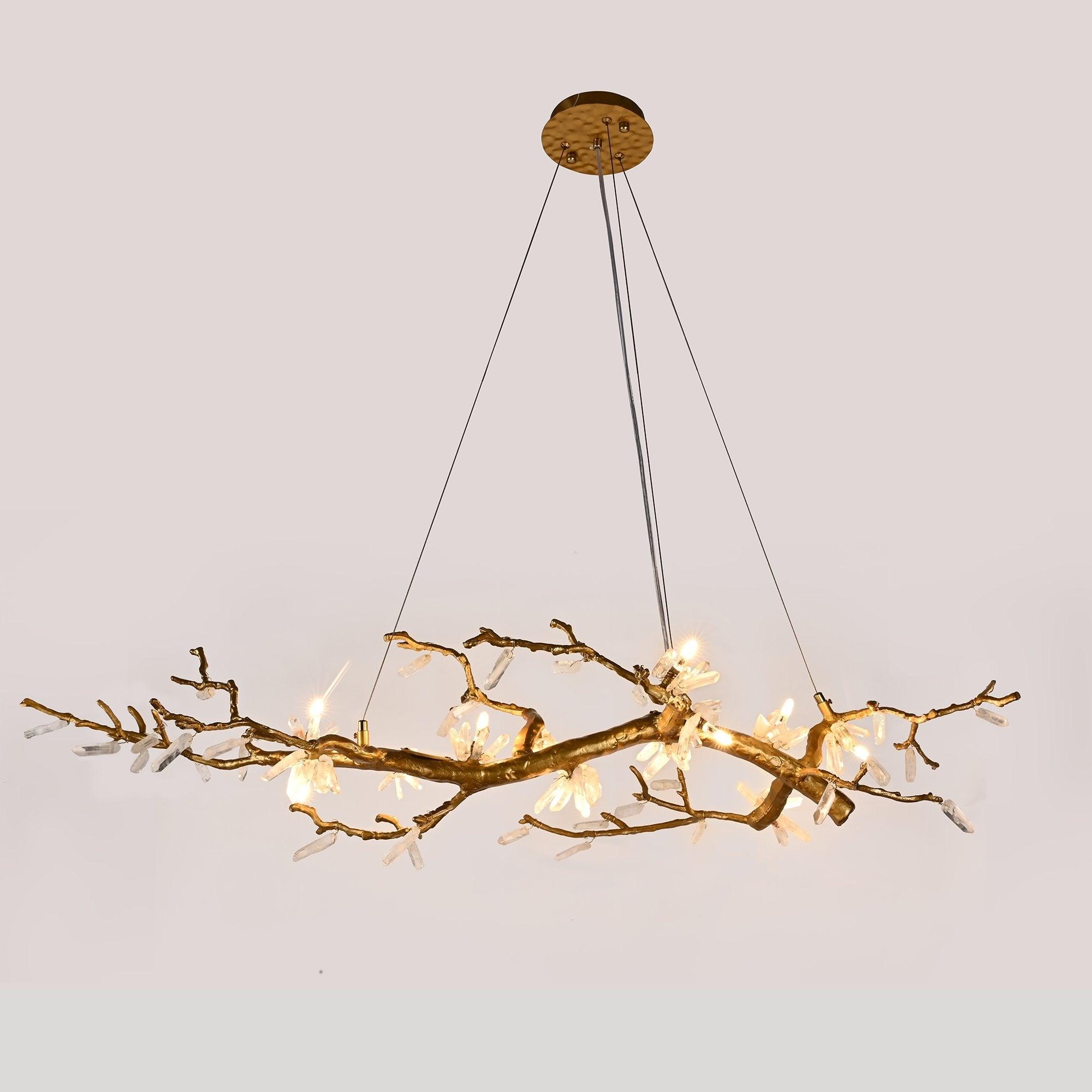 Front view of a sculptural organic chandelier with flowing contemporary forms.