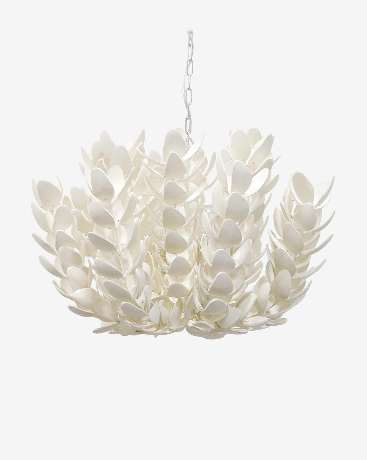 Front view of a sculptural organic chandelier with flowing contemporary forms.