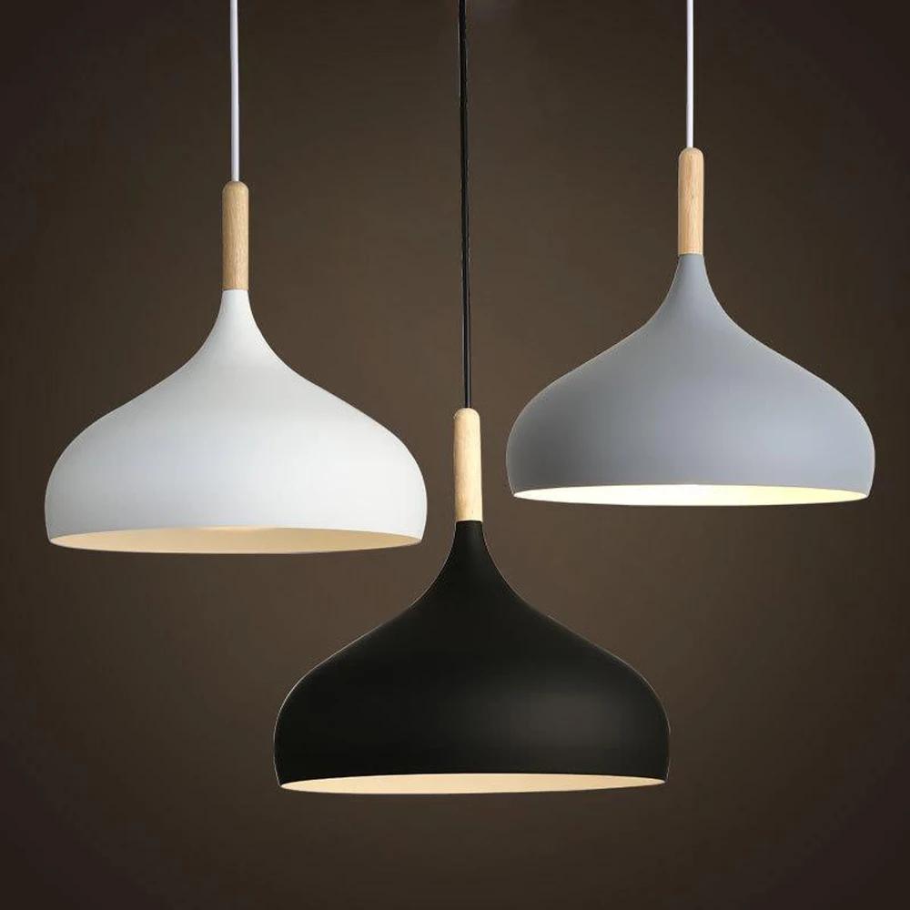 Scandinavian pendant light collection with different sizes, finishes and suspension options.