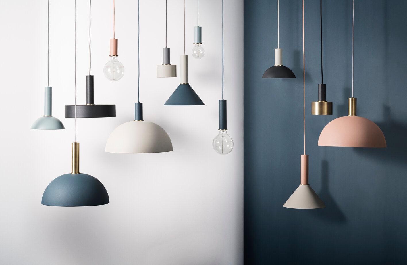 Scandinavian pendant light collection with different sizes, finishes and suspension options.